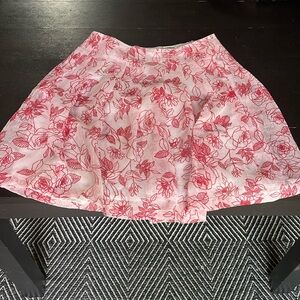 Nut floral skirt knee length in pink. No size tag. Measurements in photos. GUC